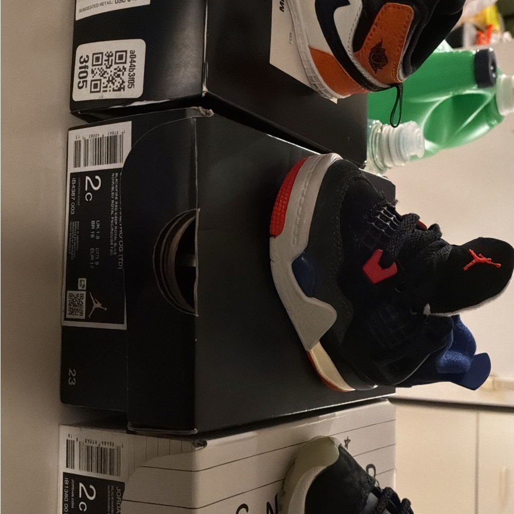 Jordan Kids Black and Orange Sneakers